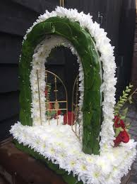 Gates Of Heaven Back View Covering Of Laurel Leaves Funeral Flowers Flower Decorations Funeral Flower Arrangements