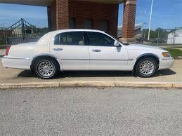 Image result for Performance White 1998 Town Car