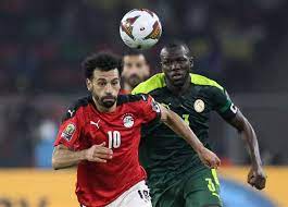 موعد مباراة منتخب مصر والسنغال اليوم الثلاثاء فى تصفيات كأس العالم. Ù…ÙˆØ¹Ø¯ Ù…Ø¨Ø§Ø±Ø§Ø© Ù…ØµØ± ÙˆØ§Ù„Ø³Ù†ØºØ§Ù„ Ø§Ù„ÙŠÙˆÙ… Ø§Ù„Ø«Ù„Ø§Ø«Ø§Ø¡ Ø§Ù„ØªØ´ÙƒÙŠÙ„ ÙˆØ§Ù„Ù‚Ù†ÙˆØ§Øª Ø§Ù„Ù†Ø§Ù‚Ù„Ø© ÙˆØ§Ù„Ù…Ø¹Ù„Ù‚ÙˆÙ† Ø§Ù„Ù…ØµØ±ÙŠ Ø§Ù„ÙŠÙˆÙ…