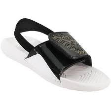 Black And Gold Nike Slides Toddler Air Jordan Hydro 7 Bt Sandals Baby Toddler Black Metallic Gold White With Images Toddler Boots Toddler Sandals Air Jordans