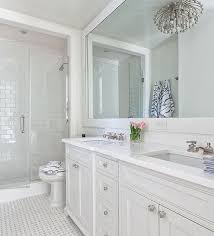 Of course, marble is costly, and it's slippery when wet. All White Bathroom With Large Mirror All White Bathroom Classic White Bathrooms White Bathroom
