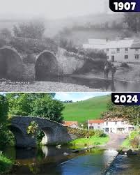 Malmsmead Bridge is a 17th-century stone bridge which crosses Badgworthy Water. Located in the Doone Valley on the border between Somerset and Devon, here's how it has looked over the last 100