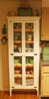 Vintage black commercial restaurant kitchen cabinets * design: 190 Combining Old Kitchen Cabinets With New Ideas Primitive Furniture Primitive Decorating Old Kitchen Cabinets