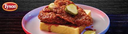 To build the sandwiches, place the hot chicken on the bottom of four rolls. Nashville Hot Chicken Tyson Food Services