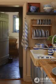 The floor is painted in pratt & lambert's gunnel. Cottage Kitchen With A Great Sink And A Collection Of Blue White Cornishware Http Whymattress Com Cottage Kitchen Design Cottage Kitchens Cottage Kitchen