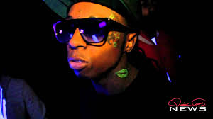 Lil Wayne Shows Off His New Black Light Tattoos