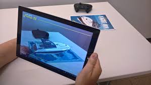 A lettermark logo with a … slight concept of exploring in it with a bold color and another accent color. How To Develop Augmented Reality Apps With Vuforia For Windows 10 Windows Developer Blog