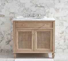 A Refined Coastal Style Defines This Bath Console The Cupboard Doors Are Woven Of Rattan For An Airy Open Feel An Single Sink Vanity Vanity Sink Single Sink
