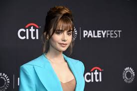 Lily Collins Makes the Skirt Suit Red-Carpet-Appropriate With a Nude Crop  Top—See Pics | Glamour