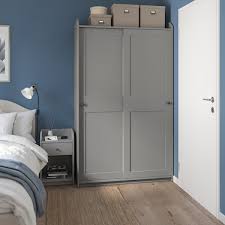 The colour theme continues throughout the room, with grey walls complementing bedside furniture. Hauga Bedside Table Grey 40x36 Cm Ikea