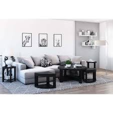 This coffee table is a practical wood and black metal coffee table with a nesting storage solution. Zayante Rustic Solid Wood 5 Piece Nesting Coffee Table Set