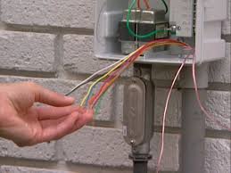 How To Wire The Electric Controller For A Sprinkler System The Electronic Controller Is The Brain Behi Sprinkler System Diy Sprinkler Repair Sprinkler System