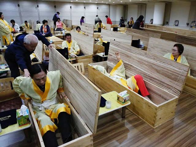 Image result for dying for a better life south koreans fake their funerals for life lessons"