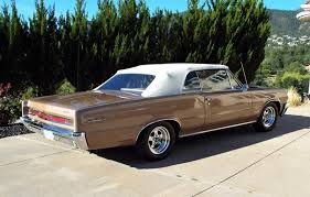 Image result for Singapore Gold 1964 GTO