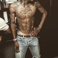 Amber rose tattoos wiz khalifa's face on her arm. Pin On Star Wiz Khalifa Face Tattoo