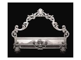 Bed With Carved Wooden Headboard Floral Decorations Idfdesign