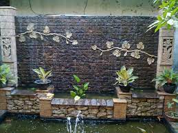 When designing a waterfall, keep it in scale with the pond. Spectacular Garden Water Wall Ideas Garden Lovers Club Outdoor Waterfalls Diy Garden Fountains Water Walls