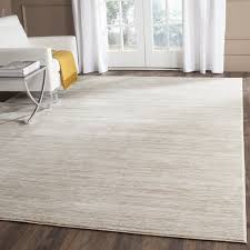 Add A Stylish Touch To Your Living Room Or Den With This Lovely Loomed Rug Showcasing A Striated Design Chic Area Rug Solid Area Rugs Cream Area Rug