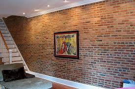 How To Create A Faux Brick Wall In Your Home Using Brick Veneer Faux Brick Panels Brick Wall Paneling Faux Brick Walls