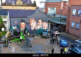Londonderry Northern Ireland 26th January 2019 The Main Characters In The Hit Channel 4 Comedy Show Derry Girls Are Being Immortalised In A New Mural On The Gable End Of Badgers Bar