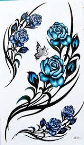 Tribal Rose Tattoo Designs Etiqueta Provisria De Rosa Tribal Do Tatuagem 3 Love These Tribal Rose Tattoos Tattoos Blue Rose Tattoos