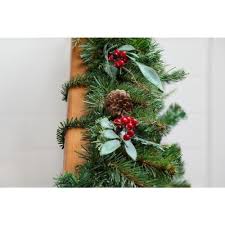 Hold the garland at the top of your banister on the outside of the staircase. Garland Ties Wreath Hangers And Accessories Christmas Greenery The Home Depot