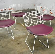 The masters entangled chair is a modern, durable chair styled after some of the most iconic chairs in the last century. Vintage Mid Century Modern Bertoia White Wire Side Chairs W Purple Seat Cushions Warehouse 414