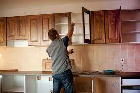 For upper and tall cabinets: How To Install Kitchen Cabinets Hometips