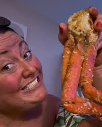 Baked crab legs with mushrooms and onion