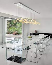 Dramatic Cascading Chandeliers Unleash Visual Splendor And Pomp Dining Room Contemporary Dining Room Design Modern Minimalist Dining Room