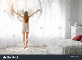 Young Woman Opening Light Curtains Bedroom Stock Photo Edit Now 1384800515