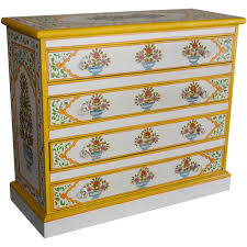 The top drawer includes a divider and the three lower drawers are extra deep for enhanced storage. Red Dahlia Hand Painted 4 Drawer Dresser