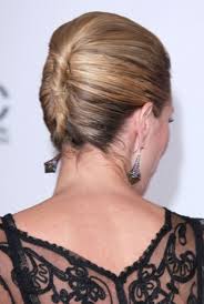 With a classic french twist you begin to twist your hair low starting at the nape of your neck, but this take on the traditional look suggests a reverse twist completed with a loose side bun. 33 Elegant French Twist Updos To Get Inspired Weddingomania