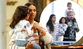Zoe saldana was born on june 19, 1978 in passaic, new jersey, to asalia nazario and aridio saldaña. Zoe Saldana Stuns In A Sweater And Bronze Boots As She Steps Out With Children And Husband Marco Daily Mail Online