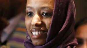 Christian college professor wearing headscarf put