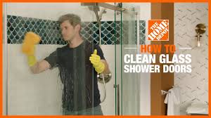 Mix the white vinegar with water in a one to three ratio and microwave in order to activate the ingredients. How To Clean Glass Shower Doors The Home Depot