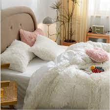 It softens the surface you are laying on. China White Color King Duvet Cover Bedding Set Bedding Sets High Quality Luxury Big Fluffy Bed Covers China Duvet Cover Bedding Set And Fluffy Bedding Duvet Cover Price