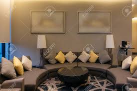 Duration home® keeps your busiest spaces protected. Luxury Modern Living Room With Pillows Furniture Picture Frame And Sofa Decoration At Night Home Interior Design Background Stock Photo Picture And Royalty Free Image Image 114918622