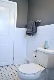 Remove painter's tape from the top of the tile. Subway Tile Wainscoting Puts Bathrooms On The Right Track