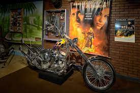A ghost bike (also referred to as a ghostcycle or whitecycle) is a bicycle roadside memorial, placed where a cyclist has been killed or severely injured, usually by the driver of a motor vehicle. Ghost Rider Chopper Hollywood Star Cars Museum