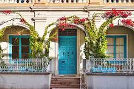 Deep gray/green upholstered walls and a complimentary colored carpet set off both the polished walnut mill work and the bold art work. Houses In Malta All The Types Of Houses In Malta