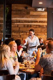 Grab a meal at the rustic, a restaurant and backyard bar patio. Dfrgmktg Hospitality Human Capital