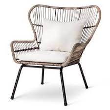 Wood is another option that offers a cozy, warm aesthetic but requires more maintenance in order to protect it from the elements. Give Your Backyard A Sophisticated Look With The Latigo All Weather Wicker Outdoor Patio Chat Set From Thresh Furniture Resin Patio Furniture Patio Furnishings