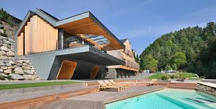 Unbelievable views and soaring timbers greet you as you enter the camp stone. Progressive Architecture Timber And Stone Two Homes In One Design