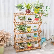 A tall flower pot will get more attention than a short one but even better is tiered flower pots. Wood Flower Pot Plant Stand 4 5 Tier Flower Planter Rack Shelf Shelves Steel Yard Garden Outdoor Living Plant Stands