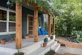 Concrete Porch Designs Porch Contemporary With Wood Columns Gray Siding Concrete Stairs Jpg 990 660 Porch Remodel Front Porch Decorating Porch Columns