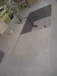 Plan De Travail En Ceramique Avec Evier Integre Laminam Par Simeg Evier Cuisine Ceramique Meuble Cuisine Eviers Cuisine