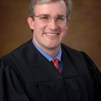 Wilkins, Creed Return to District Court Seats