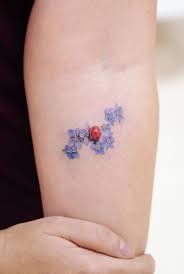 Nice color flower and red ladybug tattoos. Tattoos Archives Page 14 Of 24 Get An Inkget An Ink Page 14