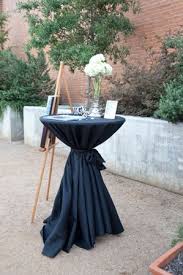 Guest Table Cocktail Table With Black Table Cloth Hydrangea Flowers Engagement Pic Wedding Cocktail Tables Cocktail Party Decor Black And White Tablecloth